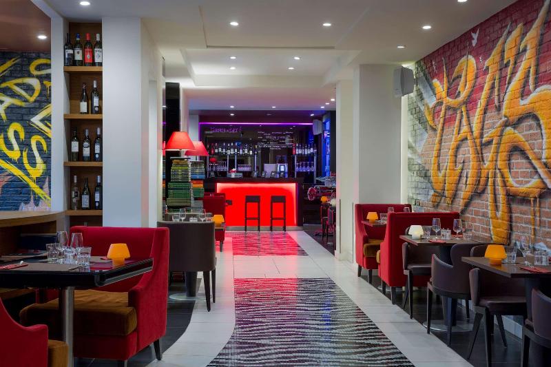 N'vY Manotel - Restoran