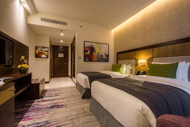 Golden Tulip Media Hotel - Oda