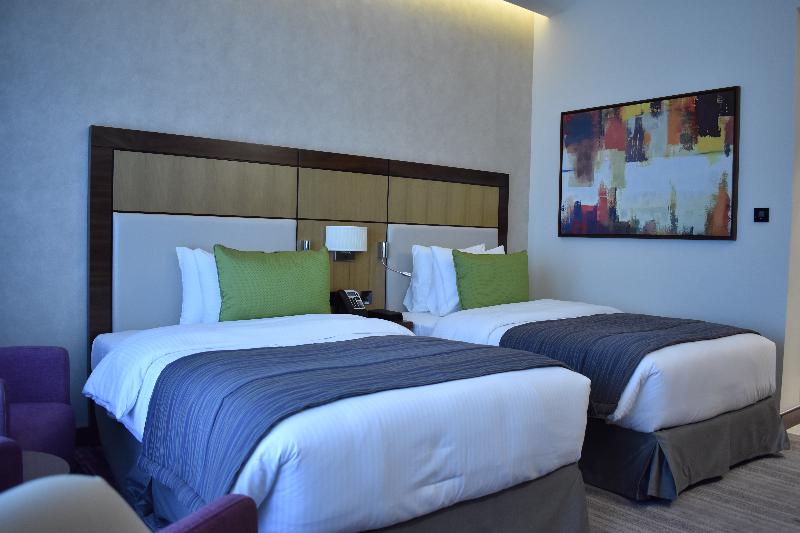 Golden Tulip Media Hotel - Oda