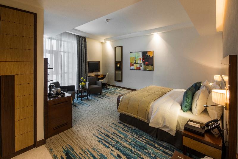 Golden Tulip Media Hotel - Oda