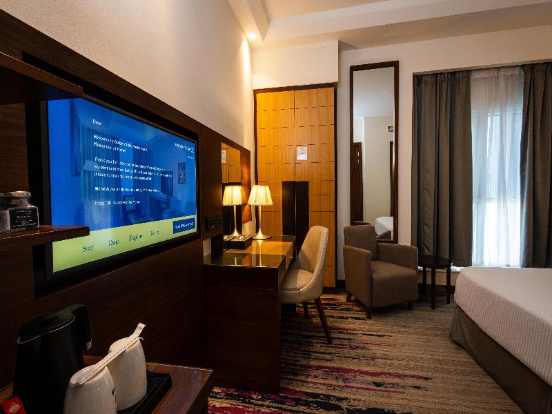 Golden Tulip Media Hotel - Oda