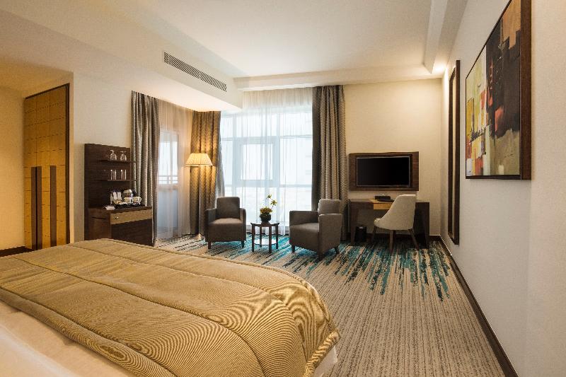 Golden Tulip Media Hotel - Oda