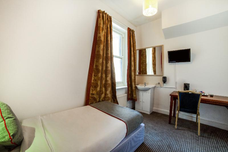 The Strand Hotel - Oda