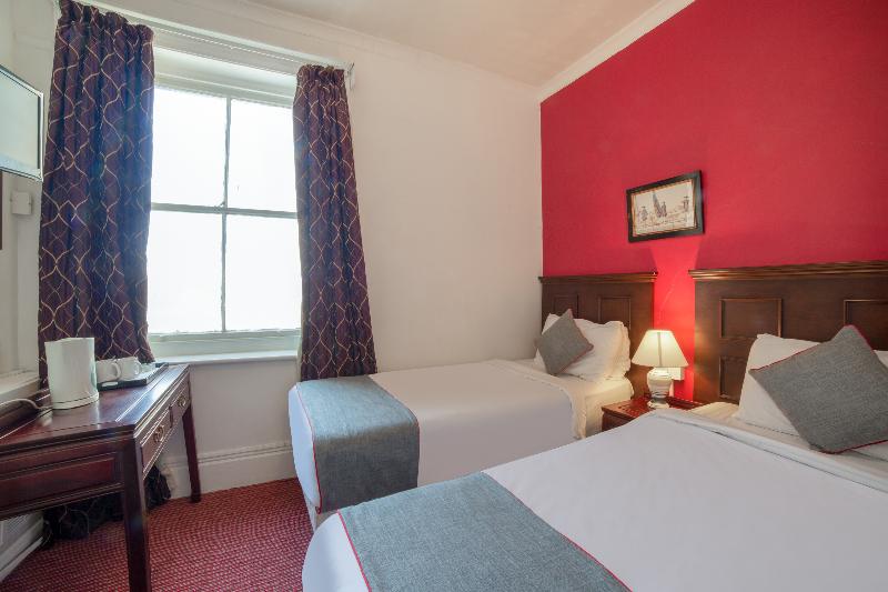 The Strand Hotel - Oda