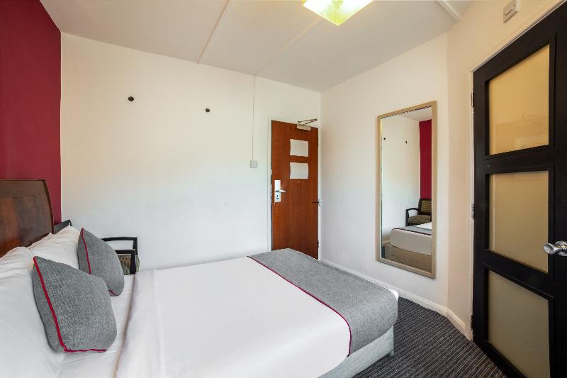 The Strand Hotel - Oda