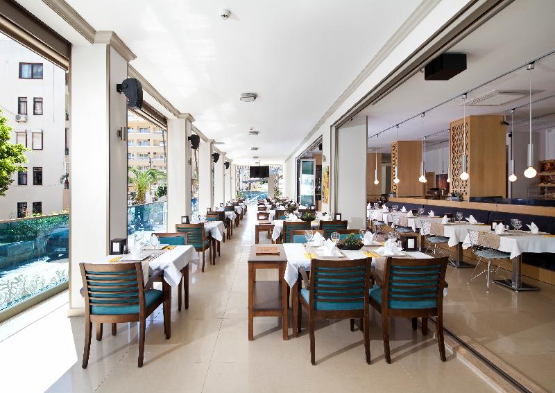 Aurasia Deluxe Hotel - Restoran