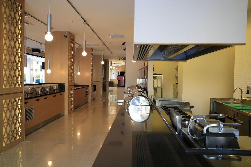 Aurasia Deluxe Hotel - Restoran