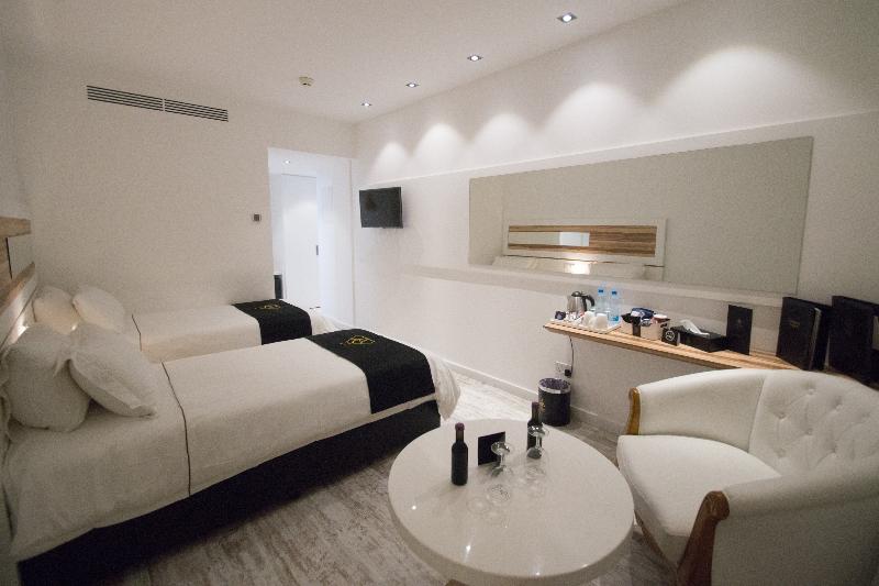 The Ciao Stelio Deluxe Hotel - Oda