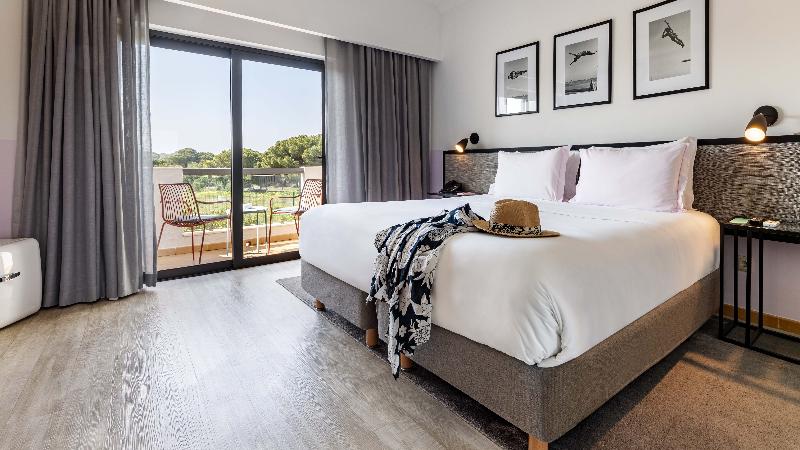 The Magnolia Hotel - Oda