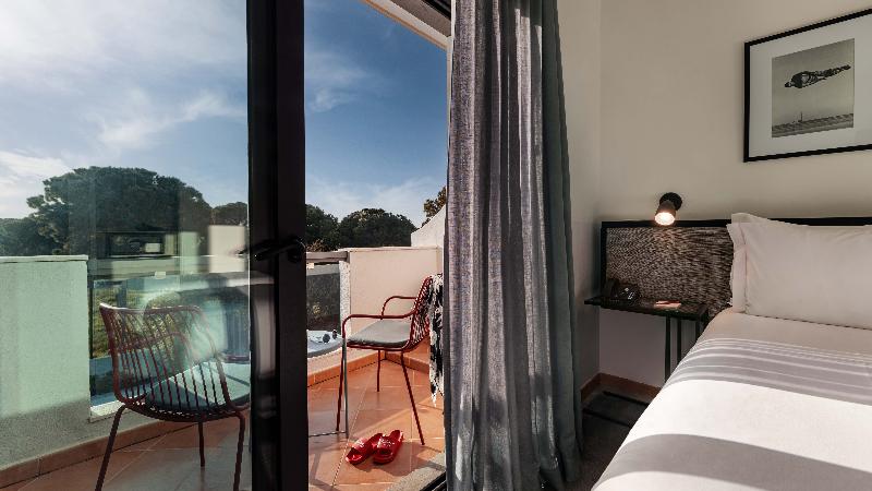 The Magnolia Hotel - Oda