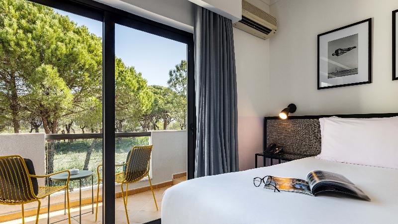 The Magnolia Hotel - Oda