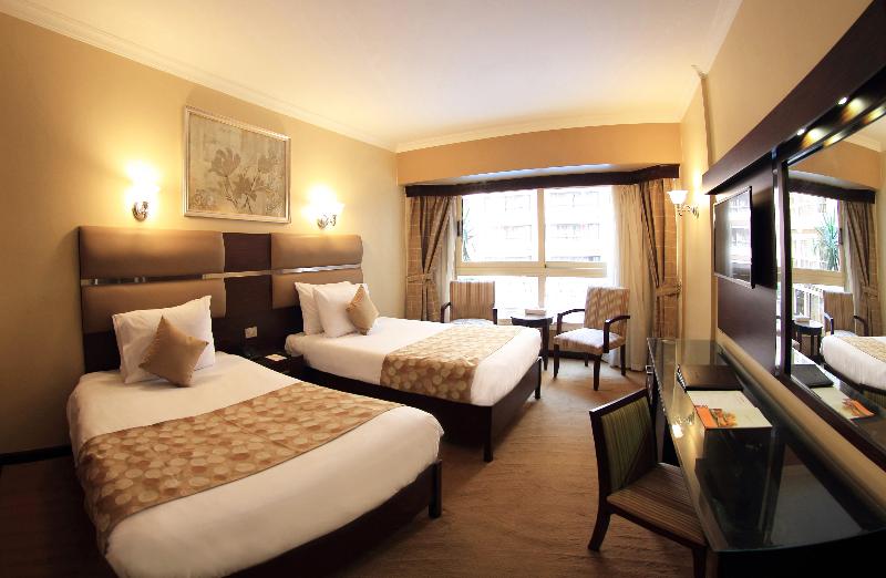 Pyramisa Suites Hotel Cairo - Oda