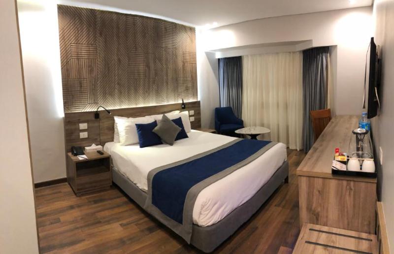 Pyramisa Suites Hotel Cairo - Oda