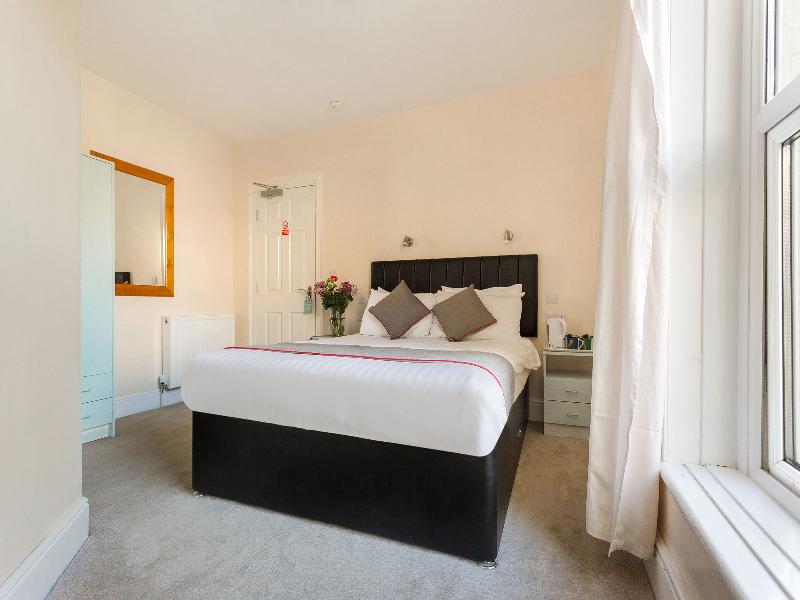 OYO Minerva Guesthouse - Oda