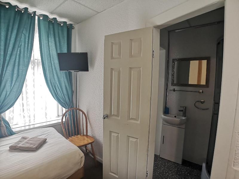 Aunties Coliseum Hotel - Oda