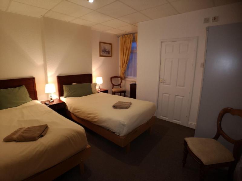 Aunties Coliseum Hotel - Oda