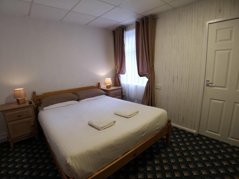 Aunties Coliseum Hotel - Oda