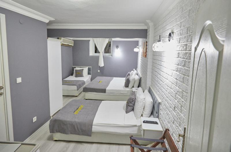 Unique Suite Hotel - Oda