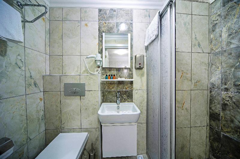 Unique Suite Hotel - Oda
