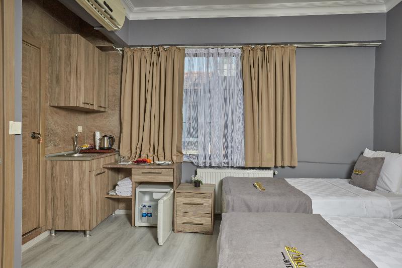 Unique Suite Hotel - Oda