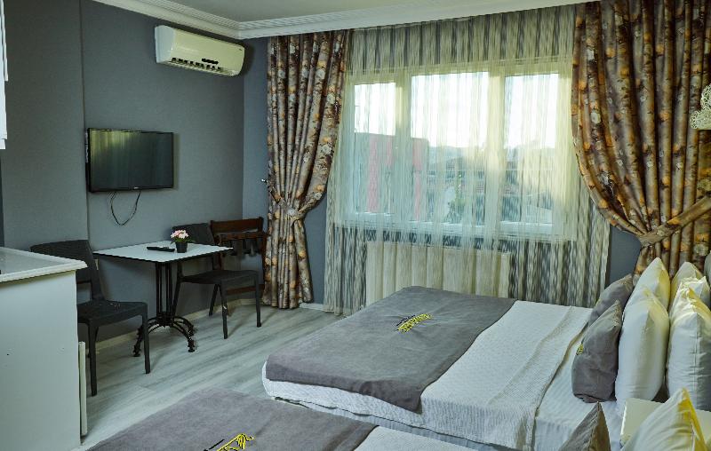 Unique Suite Hotel - Oda