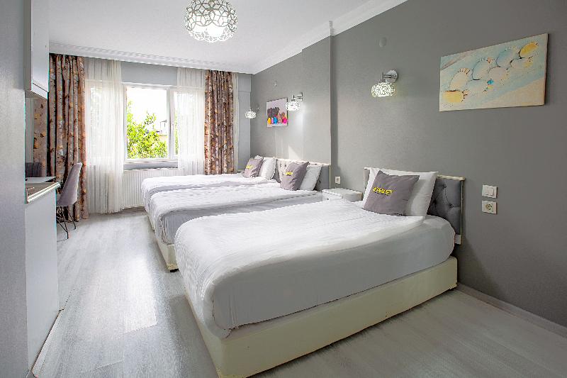 Unique Suite Hotel - Oda