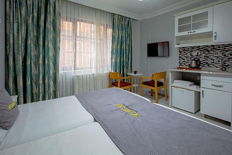 Unique Suite Hotel - Oda