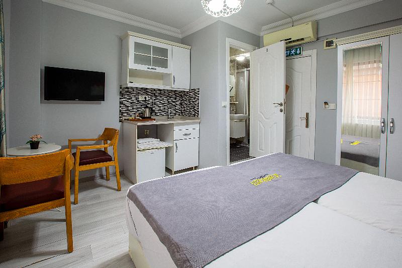 Unique Suite Hotel - Oda