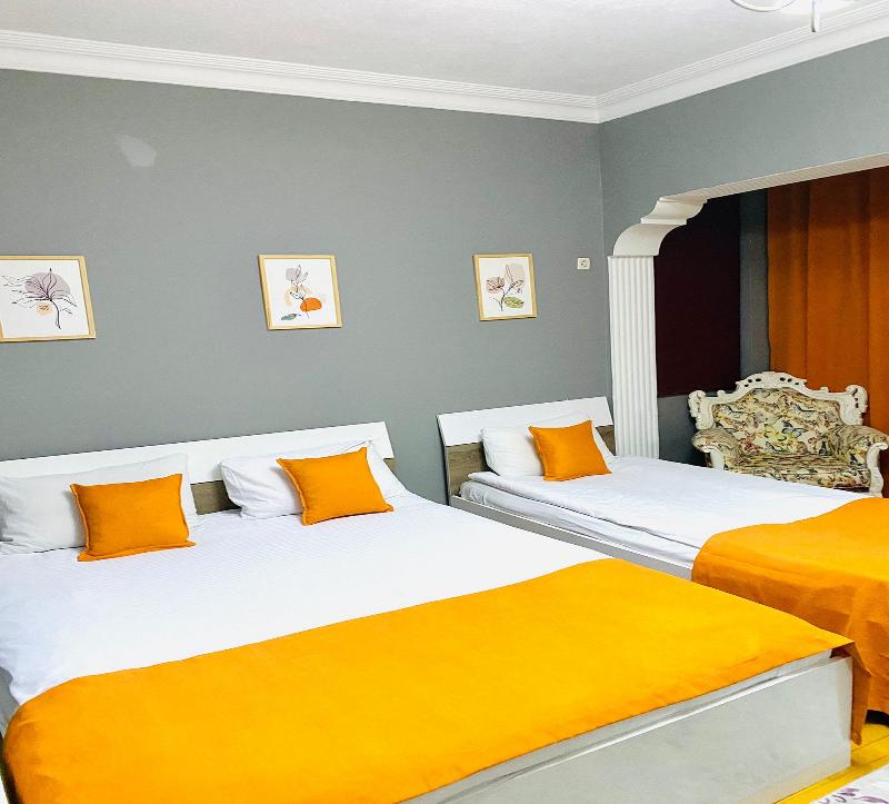 Unique Suite Hotel - Oda