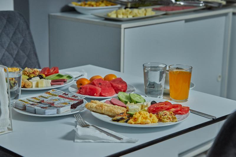 Unique Suite Hotel - Restoran