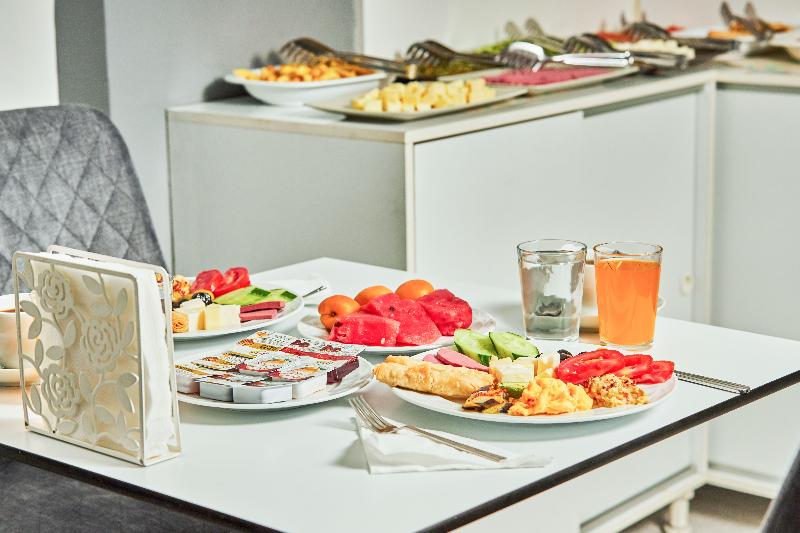 Unique Suite Hotel - Restoran