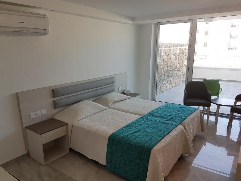 Melini Hotel Suites - Oda