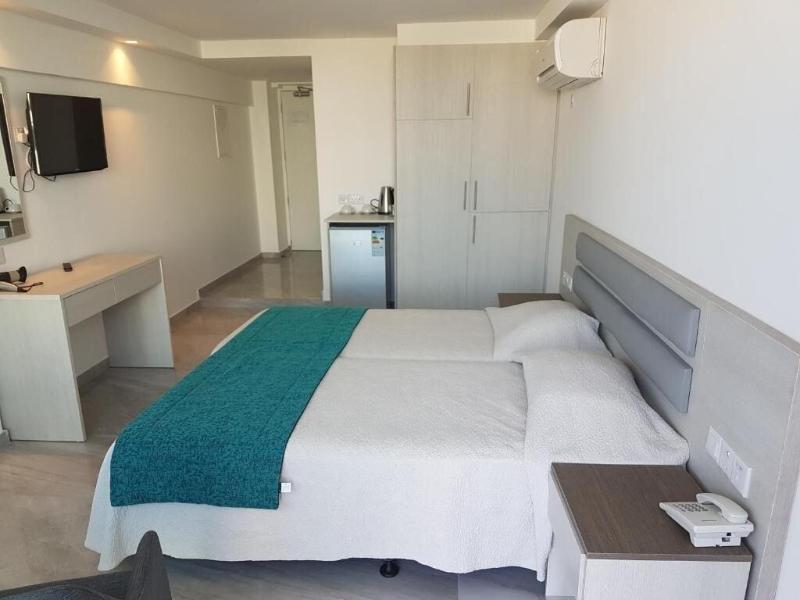 Melini Hotel Suites - Oda
