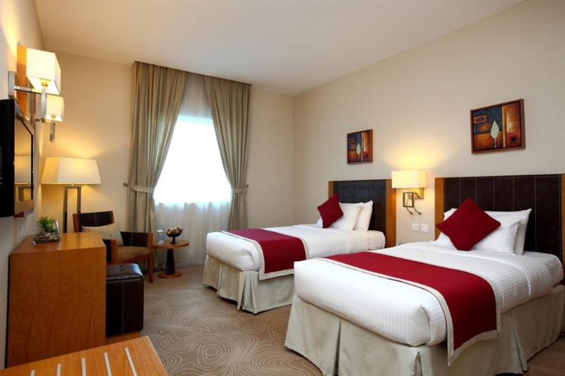Golden Tulip Hotel - Oda