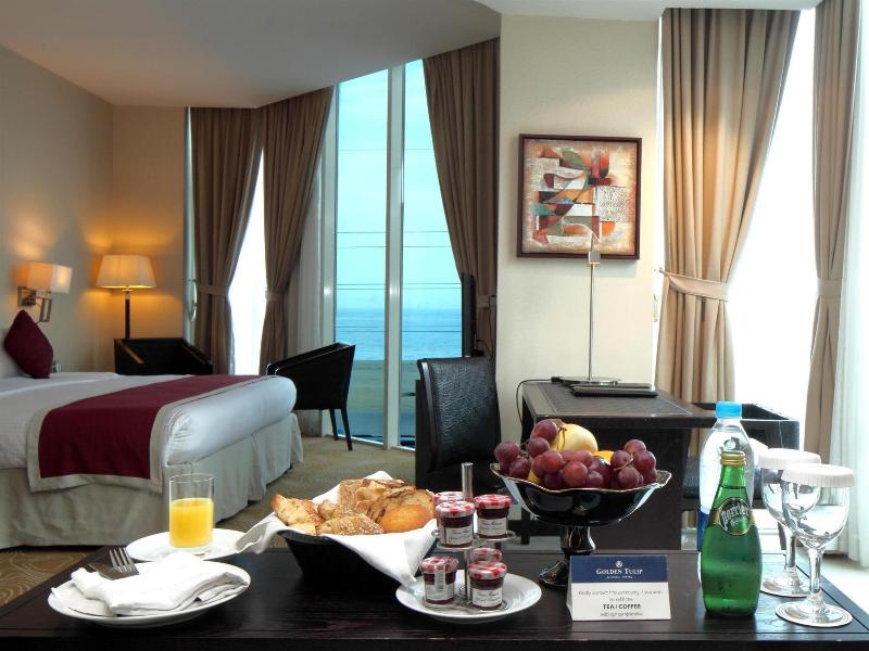 Golden Tulip Hotel - Oda