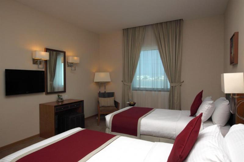 Golden Tulip Hotel - Oda