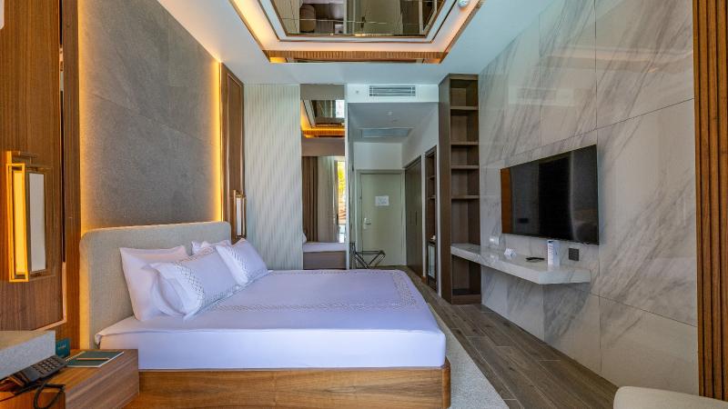 Qlusive Hotel - Oda