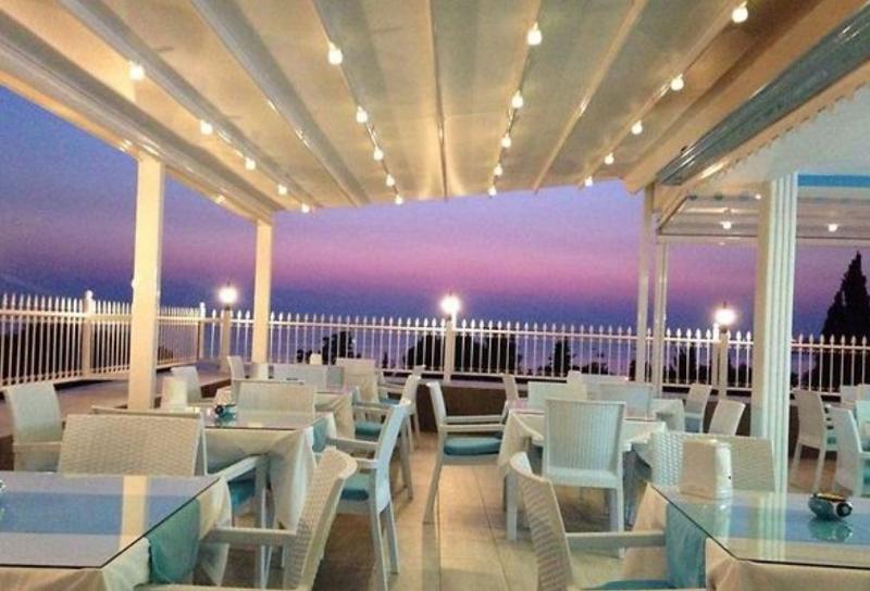 Aura Boutique Hotel - Restoran