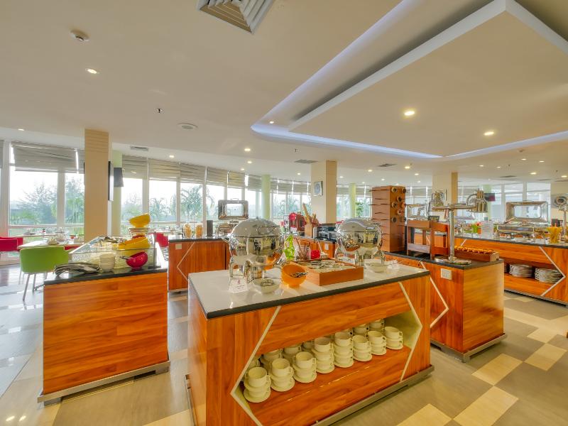 Grand Lagoi Hotel by Nirwana Gardens - Restoran