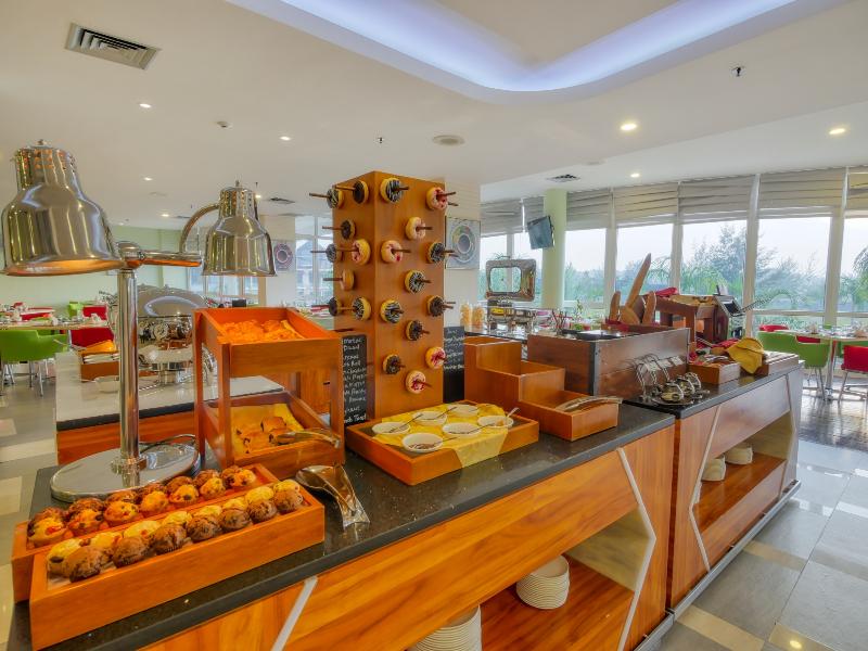 Grand Lagoi Hotel by Nirwana Gardens - Restoran