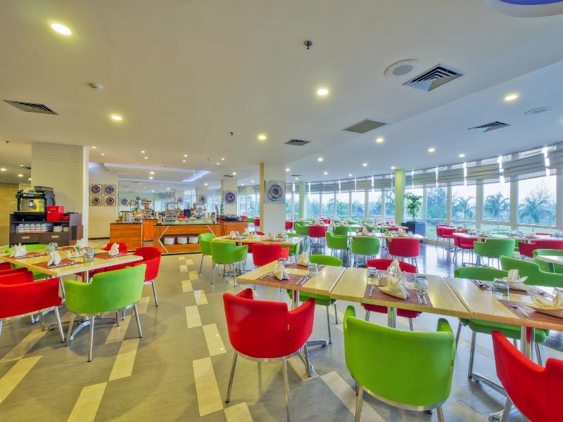 Grand Lagoi Hotel by Nirwana Gardens - Restoran