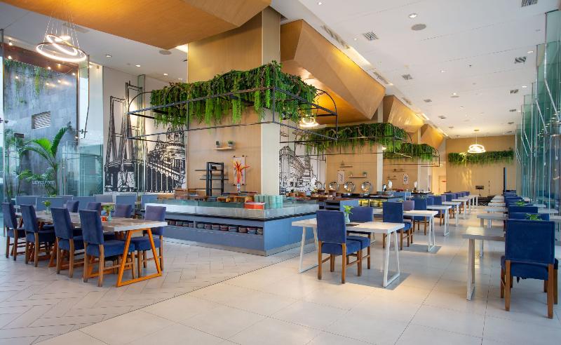 HARRIS Hotel & Conventions Gubeng Surabaya - Restoran