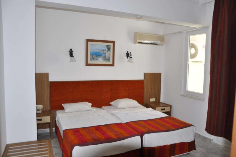 Carmen Suite Hotel - Oda
