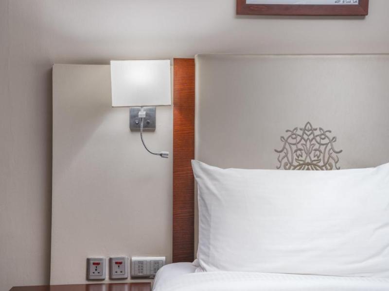 Millennium Al Aqeeq Hotel - Oda