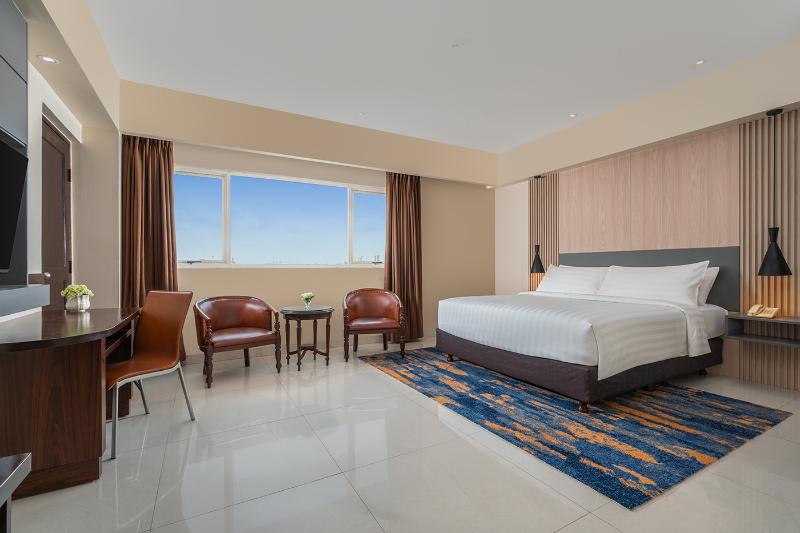 ASTON Cimone Hotel & Convention Center - Oda