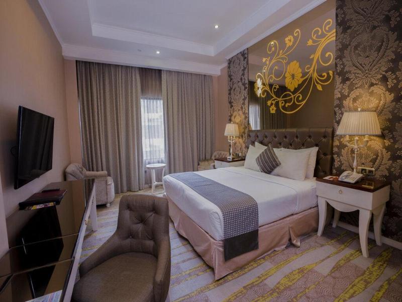 Sutan Raja Hotel and Convention Cen - Oda