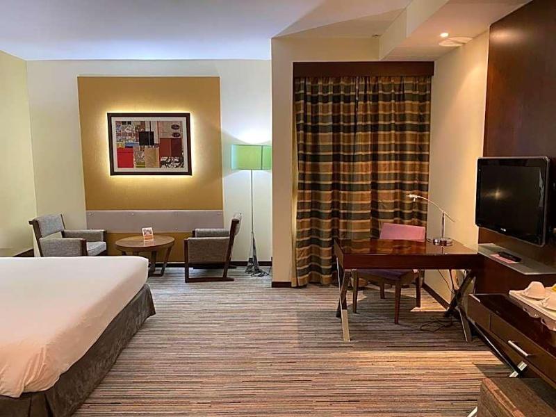 Phoenix Plaza Hotel Apartments - Oda