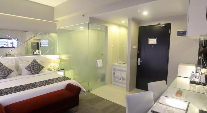Grand Darmo Suite Hotel - Oda