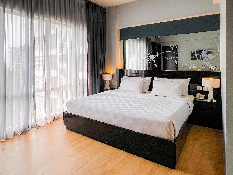 Grand Darmo Suite Hotel - Oda