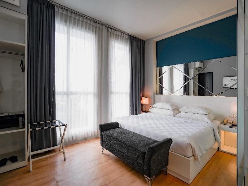 Grand Darmo Suite Hotel - Oda